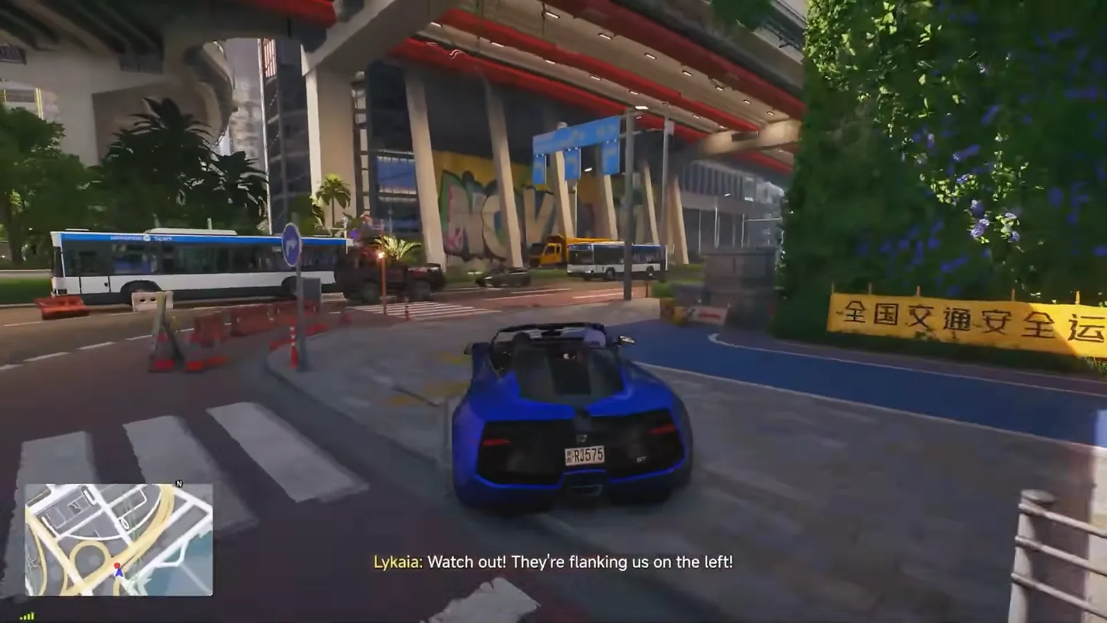 Ananta car chase under a flyover, a blue roadster driving past a bus with the minimap in the corner and Lykaia’s subtitle Watch out, they’re flanking us