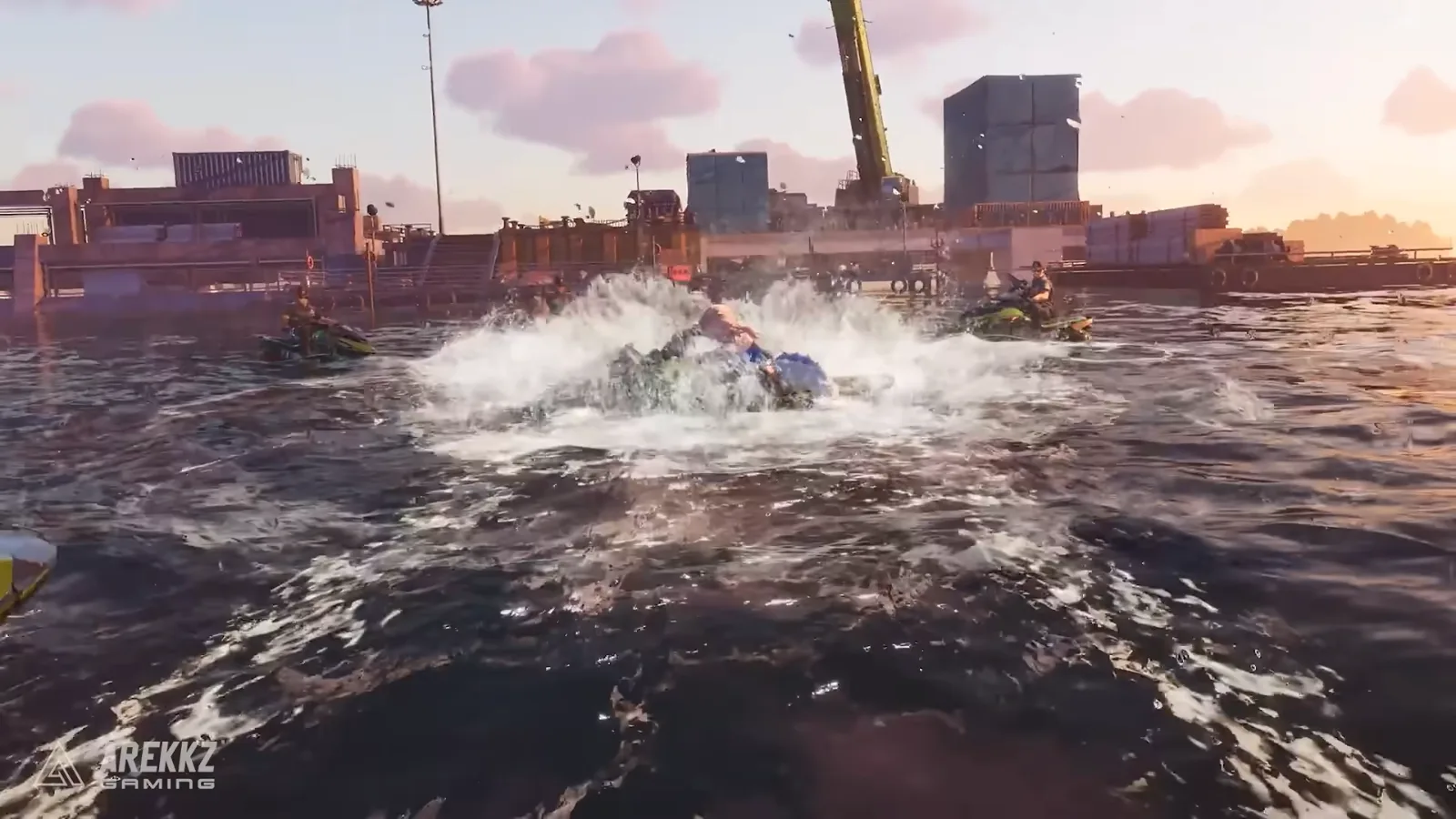Ananta jet ski chase in a harbour at sunset, a rider ploughing through spray between two other jet skis below a crane